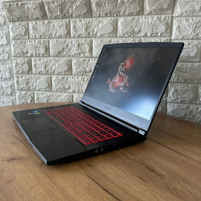 Ігровий ноутбук Б-клас MSI GF63 Thin 11UC / 15.6" (1920x1080) IPS / Intel Core i5-11400H (6 (12) ядер по 2.7 - 4.5 GHz) / 16 GB DDR4 / 512 GB SSD / nVidia GeForce RTX 3050, 4 GB GDDR6, 128-bit / WebCam б/в - зображення 5