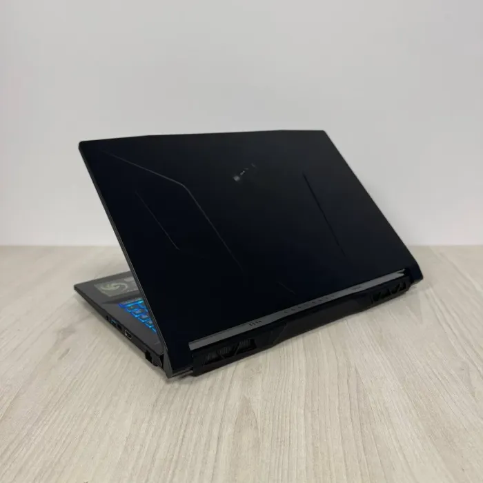 Ігровий ноутбук MSI Bravo 15 C7VFK / 15.6" (1920x1080) IPS / AMD Ryzen 7 7735HS (8 (16) ядер по 3,2 - 4,75 ГГц) / 16 ГБ DDR5 / 512 ГБ SSD NVMe / nVidia GeForce RTX 4060, 8 ГБ GDDR6, 128-bit / WebCam б/в - зображення 6