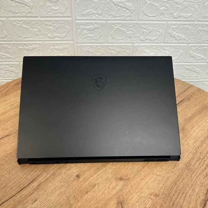 Ігровий ноутбук Б-клас MSI GS66 Stealth 11UG / 15.6" (1920x1080) IPS / Intel Core i7-11800H (8 (16) ядер по 2.3 - 4.6 GHz) / 16 GB DDR4 / 1000 GB SSD NVMe / nVidia GeForce RTX 3070, 8 GB GDDR6, 256-bit / WebCam б/в - зображення 3