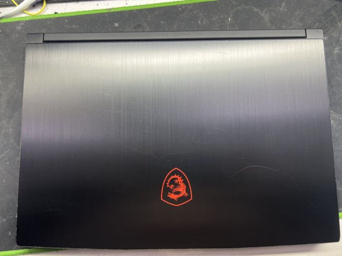 Ігровий ноутбук Б-класу MSI GF63 Thin 11SC MS-16R6 / 15.6" (1920x1080) IPS / Intel Core i5-11400H (6 (12) ядер по 2,7 - 4,5 ГГц) / 16 ГБ DDR4 / 960 ГБ SSD / nVidia GeForce GTX 1650 Max-Q, 4 ГБ GDDR6, 128-біт / WebCam б/в - изображение 7