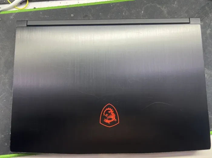 Ігровий ноутбук Б-класу MSI GF63 Thin 11SC MS-16R6 / 15.6" (1920x1080) IPS / Intel Core i5-11400H (6 (12) ядер по 2,7 - 4,5 ГГц) / 16 ГБ DDR4 / 960 ГБ SSD / nVidia GeForce GTX 1650 Max-Q, 4 ГБ GDDR6, 128-біт / WebCam б/в - зображення 7