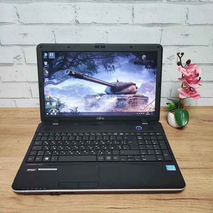 Ноутбук Б-клас Fujitsu LifeBook A512 / 15.6" (1366x768) TN / Intel Core i3-3110M (2 (4) ядра по 2.4 GHz) / 8 GB DDR3 / 120 GB SSD / Intel HD Graphics 4000 / WebCam / DVD-ROM / VGA б/в - зображення 2