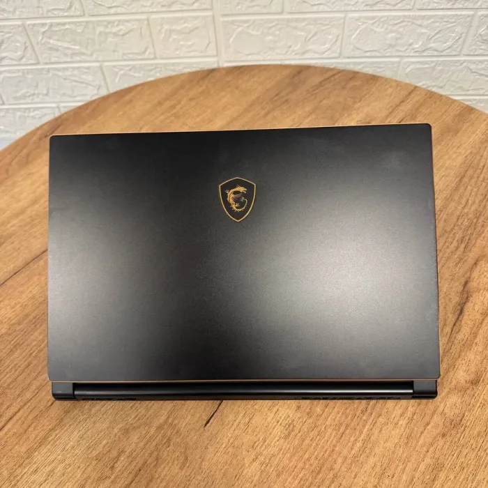 Ігровий ноутбук Б-клас MSI GS65 Stealth 9SF / 15.6" (1920x1080) IPS / Intel Core i7-9750H (6 (12) ядер по 2.6 - 4.5 GHz) / 16 GB DDR4 / 512 GB SSD NVMe / nVidia GeForce RTX 2070 Max-Q, 8 GB GDDR6, 256-bit / WebCam б/в - зображення 3