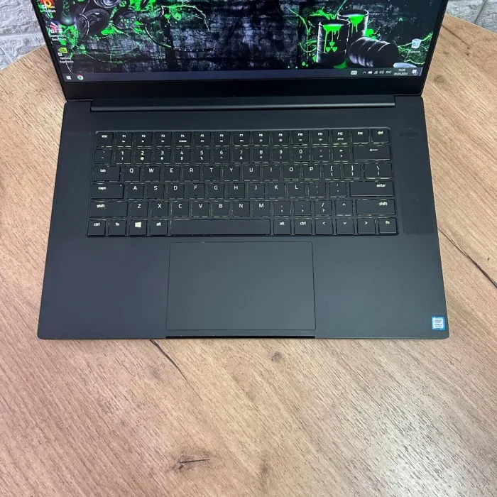 Ігровий ноутбук Б-клас Razer Blade 15 RZ09-0300 / 15.6" (1920x1080) IPS / Intel Core i7-9750H (6 (12) ядер по 2.6 - 4.5 GHz) / 16 GB DDR4 / 128 GB SSD M.2 + 1000 GB HDD / nVidia GeForce RTX 2060, 6 GB GDDR6, 192-bit / WebCam б/в - зображення 7