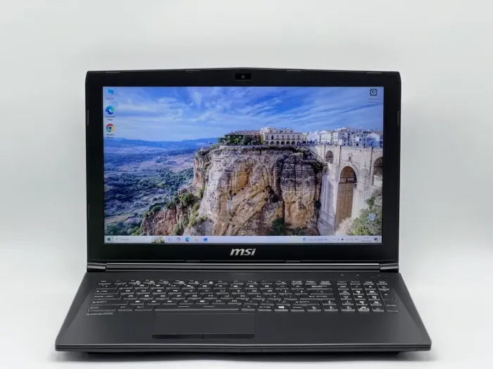 Ігровий ноутбук MSI GL62M 7RD / 15.6" (1920x1080) IPS / Intel Core i7-7700HQ (4 (8) ядра по 2,8 - 3,8 ГГц) / 16 ГБ DDR4 / 128 ГБ SSD + 1000 ГБ HDD / nVidia GeForce GTX 1050, 2 ГБ GDDR5, 128-біт / WebCam / HDMI б/в - зображення 2