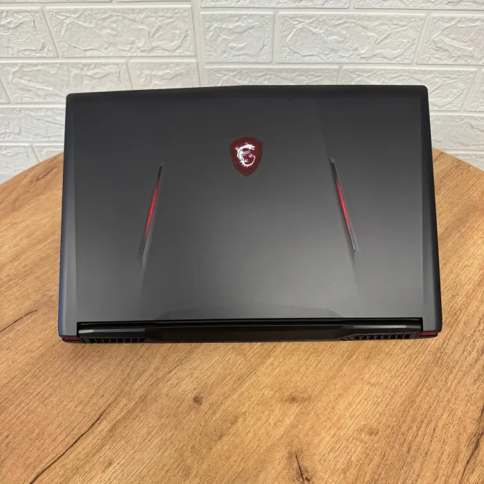 Ігровий ноутбук Б-клас MSI GL63 9SDK / 15.6" (1920x1080) IPS / Intel Core i7-9750H (6 (12) ядер по 2.6 - 4.5 GHz) / 16 GB DDR4 / 512 GB SSD / nVidia GeForce GTX 1660 Ti, 6 GB GDDR6, 192-bit / WebCam б/в - зображення 3