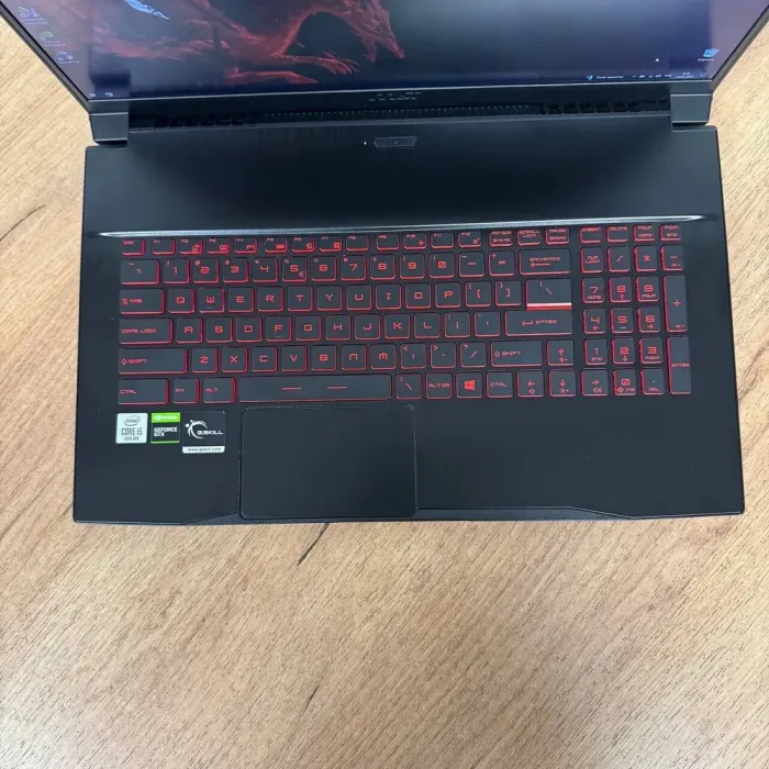 Ігровий ноутбук Б-клас MSI GF75 Thin 10SCSXR / 17.3" (1920x1080) IPS / Intel Core i5-10300H (4 (8) ядра по 2.5 - 4.5 GHz) / 16 GB DDR4 / 512 GB SSD / nVidia GeForce GTX 1650 Ti, 4 GB GDDR6, 128-bit / WebCam б/в - зображення 7