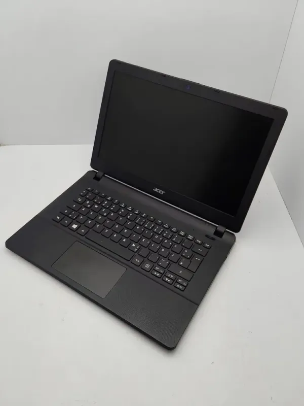 Ноутбук Acer E1-311 / 14" (1366x768) TN / Intel Celeron N2940 (4 ядра по 1.83 - 2.25 GHz) / 4 GB DDR3 / 500 GB HDD / Intel HD Graphics / WebCam б/в - зображення 4