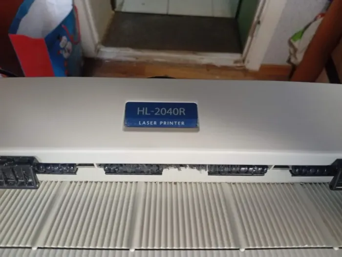 Принтер Б-клас Brother HL-2040R / Лазерний монохромний друк / 600x600 dpi / A4 / 20 стор/хв / USB 2.0, LPT б/в - зображення 3