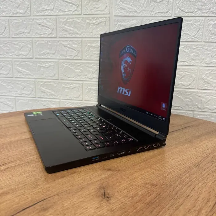 Ігровий ноутбук MSI GS65 Stealth Thin 8RF / 15.6" (1920x1080) IPS / Intel Core i7-8750H (6 (12) ядер по 2.2 - 4.1 GHz) / 32 GB DDR4 / 512 GB SSD NVMe / nVidia GeForce GTX 1070 Max-Q, 8 GB GDDR5, 256-bit / WebCam б/в - зображення 5