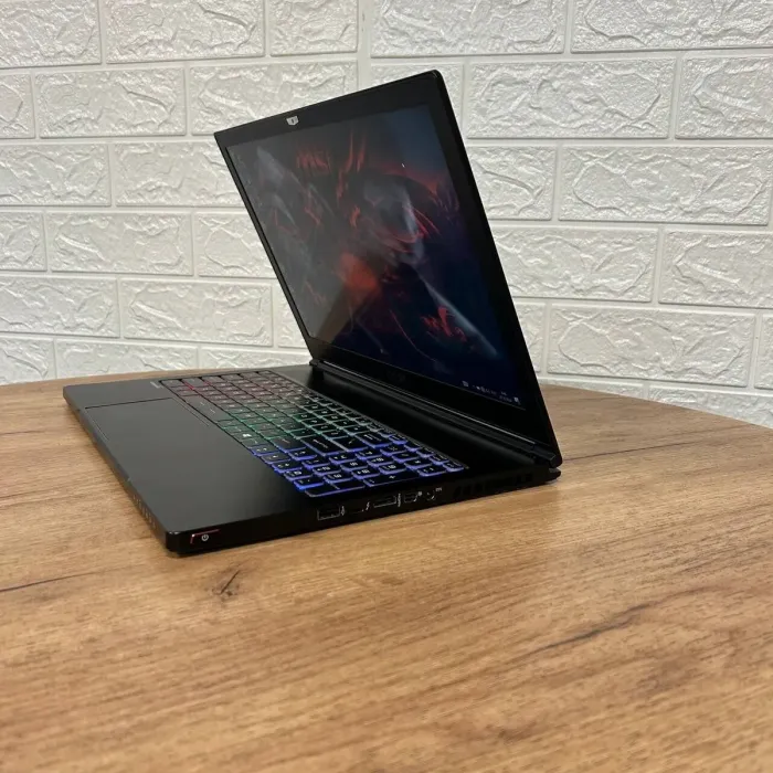 Ігровий ноутбук Б-клас MSI GS63VR Stealth 6RF / 15.6" (1920x1080) IPS / Intel Core i7-6700HQ (4 (8) ядра по 2.6 - 3.5 GHz) / 16 GB DDR4 / 128 GB SSD M.2 + 1000 GB HDD / nVidia GeForce GTX 1060, 6 GB GDDR5, 192-bit / WebCam б/в - зображення 5