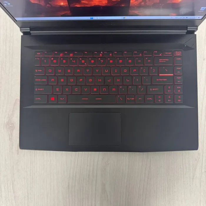 Ігровий ноутбук Б-класу MSI GF63 Thin 11UC / 15.6" (1920x1080) IPS / Intel Core i5-11400H (6 (12) ядер по 2,7 - 4,5 ГГц) / 8 ГБ DDR4 / 512 ГБ SSD NVMe / nVidia GeForce RTX 3050, 4 ГБ GDDR6, 128-bit / WebCam б/в - зображення 7