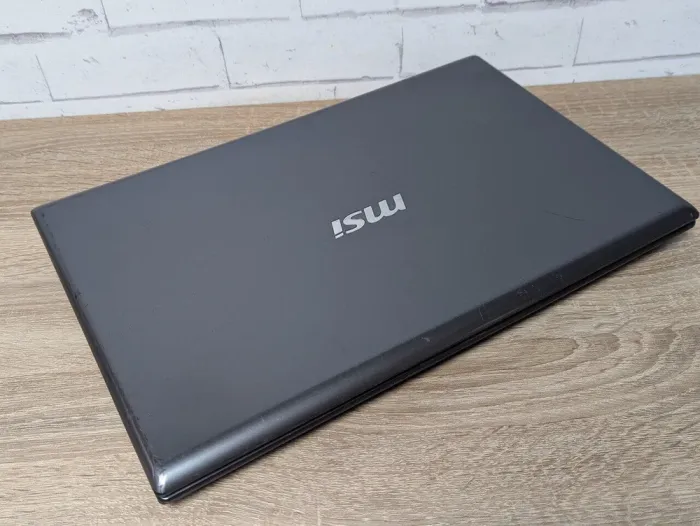 Ноутбук Б-клас MSI CR70 / 17.3" (1920x1080) TN / Intel Core i3-4000M (2 (4) ядра по 2.4 GHz) / 8 GB DDR3 / 128 GB SSD / Intel HD Graphics 4600 / WebCam б/в - зображення 8