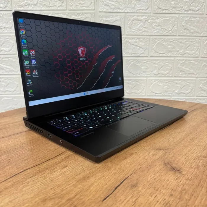 Ігровий ноутбук Б-клас MSI GP66 Leopard 11UH / 15.6" (1920x1080) IPS / Intel Core i7-11800H (8 (16) ядер по 1.9 - 4.6 GHz) / 32 GB DDR4 / 1000 GB SSD NVMe / nVidia GeForce RTX 3080, 8 GB GDDR6, 256-bit / WebCam б/в - зображення 4