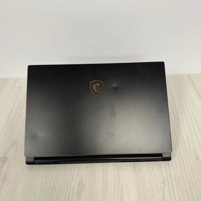 Ігровий ноутбук Б-клас MSI GS65 Stealth 9SE / 15.6" (1920x1080) IPS / Intel Core i7-9750H (6 (12) ядер по 2.6 - 4.5 GHz) / 16 GB DDR4 / 512 GB SSD NVMe / nVidia GeForce RTX 2060, 6 GB GDDR6, 192-bit / WebCam б/в - зображення 3