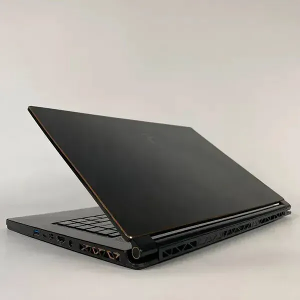 Ігровий ноутбук Б-клас MSI GS65 Stealth Thin 8RF / 15.6" (1920x1080) IPS / Intel Core i7-8750H (6 (12) ядер по 2.2 - 4.1 GHz) / 16 GB DDR4 / 512 GB SSD / nVidia GeForce GTX 1070 Max-Q, 8 GB GDDR5, 256-bit / WebCam б/в - зображення 7