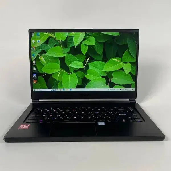 Ігровий ноутбук Б-клас MSI GS65 Stealth Thin 8RF / 15.6" (1920x1080) IPS / Intel Core i7-8750H (6 (12) ядер по 2.2 - 4.1 GHz) / 16 GB DDR4 / 512 GB SSD / nVidia GeForce GTX 1070 Max-Q, 8 GB GDDR5, 256-bit / WebCam б/в - зображення 2