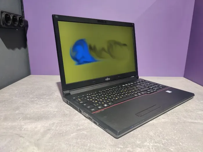 Ноутбук Fujitsu LifeBook E556 / 15.6" (1920x1080) IPS / Intel Core i5-6200U (2 (4) ядра по 2.3 - 2.8 GHz) / 8 GB DDR4 / 120 GB SSD / Intel HD Graphics 520 / WebCam б/в - зображення 4