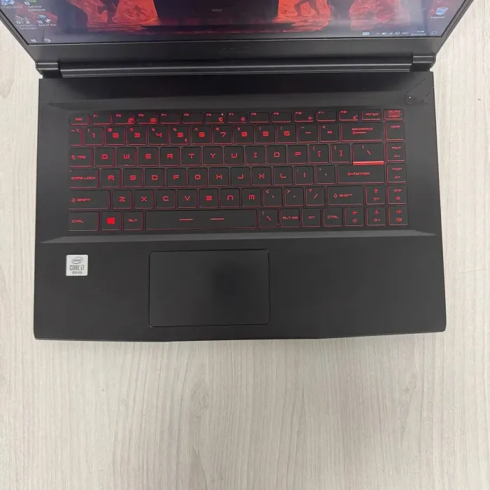 Ігровий ноутбук Б-клас MSI GF65 Thin 10SER / 15.6" (1920x1080) IPS / Intel Core i7-10750H (6 (12) ядер по 2.6 - 5.0 GHz) / 16 GB DDR4 / 512 GB SSD NVMe / nVidia GeForce RTX 2060, 6 GB GDDR6, 192-bit / WebCam б/в - зображення 7
