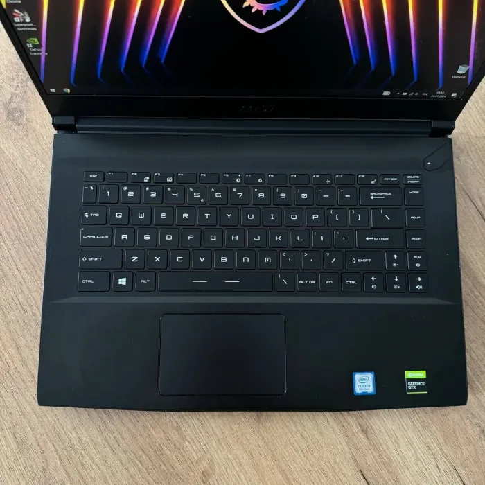 Ігровий ноутбук MSI GF63 Thin 9SCX / 15.6" (1920x1080) IPS / Intel Core i5-9300H (4 (8) ядра по 2.4 - 4.1 GHz) / 8 GB DDR4 / 512 GB SSD / nVidia GeForce GTX 1650 Max-Q, 4 GB GDDR6, 128-bit / WebCam б/в - зображення 7