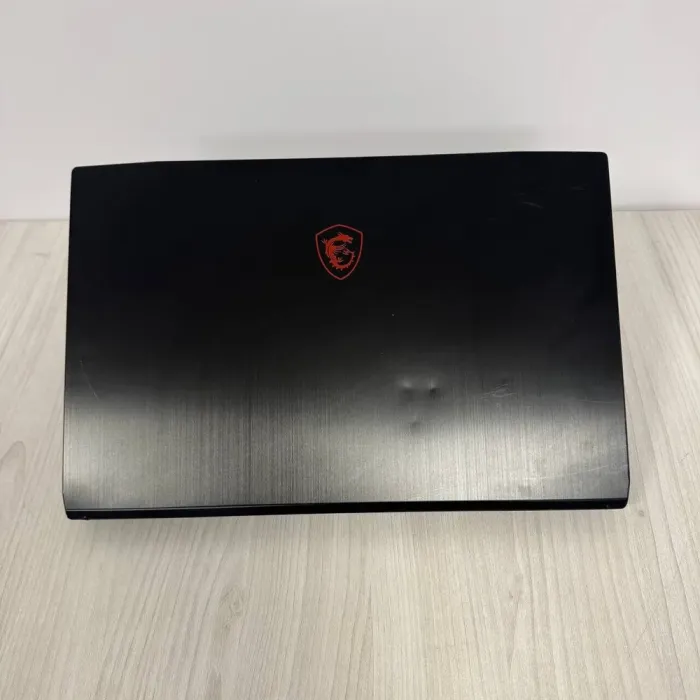 Ігровий ноутбук Б-клас MSI GF75 Thin 10UEK / 15.6" (1920x1080) IPS / Intel Core i7-10750H (6 (12) ядер по 2.6 - 5.0 GHz) / 16 GB DDR4 / 512 GB SSD NVMe / nVidia GeForce RTX 3060, 6 GB GDDR6, 192-bit / WebCam б/в - зображення 3