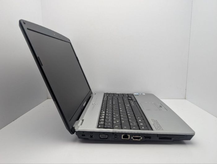Ноутбук Medion 2180 / 15.4" (1366x768) TN / Intel Pentium T2330 (2 ядра по 1.6 GHz) / 4 GB DDR2 / 250 GB HDD / nVidia GeForce 9300M, 256 MB GDDR2, 64-bit / WebCam / DVD-ROM б/в - зображення 4