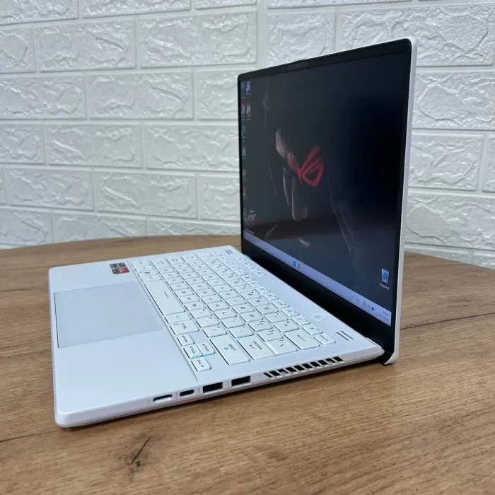 Ігровий ноутбук Б-клас Asus ROG Zephyrus G14 GA402RJ / 14" (2560x1600) IPS / AMD Ryzen 9 6900HS (8 (16) ядер по 3.3 - 4.9 GHz) / 16 GB DDR5 / 1000 GB SSD / AMD Radeon RX 6700S, 8 GB GDDR6, 128-bit / WebCam б/в - зображення 4