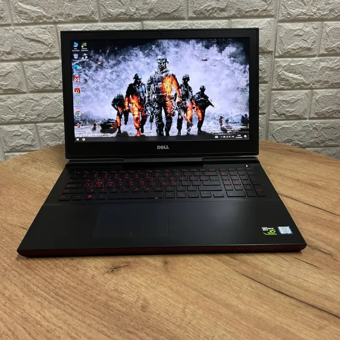 Ігровий ноутбук Б-клас Dell Inspiron 15 Gaming 7567 / 15.6" (1920x1080) IPS / Intel Core i5-7300HQ (4 ядра по 2.5 - 3.5 GHz) / 8 GB DDR4 / 128 GB SSD M.2 + 1000 GB HDD / nVidia GeForce GTX 1050, 4 GB GDDR5, 128-bit / WebCam б/в - зображення 2