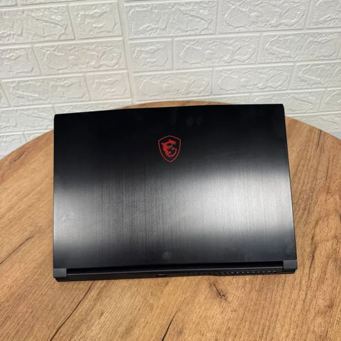 Ігровий ноутбук MSI GF63 Thin 10SC / 15.6" (1920x1080) IPS / Intel Core i5-10500H (6 (12) ядер по 2.5 - 4.5 GHz) / 16 GB DDR4 / 128 GB SSD NVMe + 1000 GB HDD / nVidia GeForce GTX 1650 Max-Q, 4 GB GDDR6, 128-bit / WebCam б/в - зображення 3