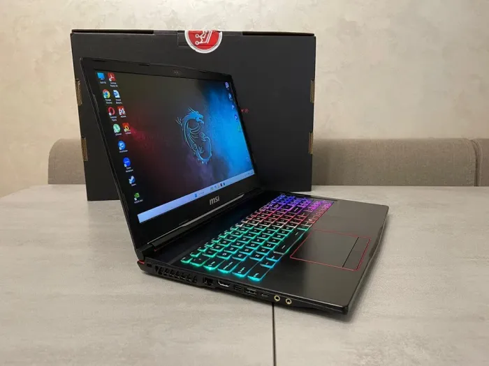Ігровий ноутбук MSI Raider GE63 RGB 9SG / 15.6" (1920x1080) IPS / Intel Core i7-9750H (6 (12) ядер по 2.6 - 4.5 GHz) / 32 GB DDR4 / 512 GB SSD + 1000 GB HDD / nVidia GeForce RTX 2080, 8 GB GDDR6, 256-bit / WebCam б/в - зображення 5