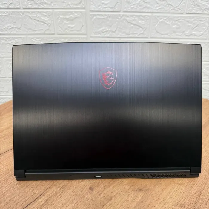 Ігровий ноутбук Б-клас MSI GF63 Thin GF63 12UCX / 15.6" (1920x1080) IPS / Intel Core i5-12450H (8 (12) ядер по 3.3 - 4.4 GHz) / 8 GB DDR4 / 512 GB SSD / nVidia GeForce RTX 2050, 4 GB GDDR6, 64-bit б/в - зображення 3