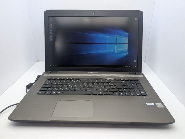 Ноутбук Medion Akoya E7225 / 17.3" (1600x900) TN / Intel Celeron N2840 (2 ядра по 2.16 - 2.58 GHz) / 8 GB DDR3 / 120 GB SSD / Intel HD Graphics / WebCam / DVD-ROM / АКБ не тримає б/в - зображення 2
