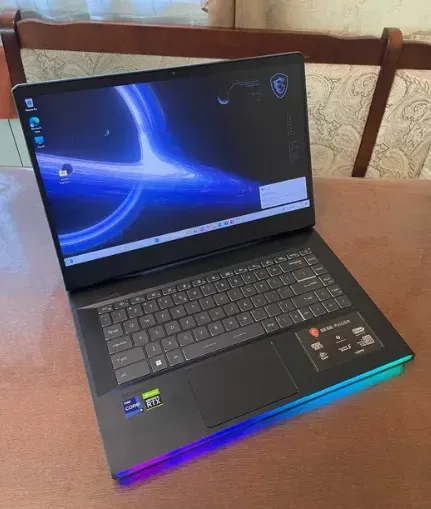 Ігровий ноутбук Б-клас MSI GE66 Raider 11UH-202US / 15.6" (2560x1440) IPS / Intel Core i9-11980HK (8 (16 ядер по 3.3 - 5.0 GHz) / 32 GB DDR4 / 1000 GB SSD / nVidia GeForce RTX 3080, 16 GB GDDR6, 256-bit / WebCam б/в - зображення 2