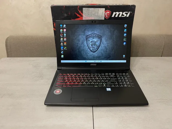 Ігровий ноутбук MSI GP62MVR 7RFX Leopard Pro / 15,6" (1920x1080) IPS / Intel Core i7-7700HQ (4 (8) ядра по 2,8 - 3,8 ГГц) / 16 ГБ DDR4 / 256 ГБ SSD + 1000 ГБ HDD / nVidia GeForce GTX 1060, 6 ГБ GDDR5, 192-біт / WebCam б/в - зображення 2