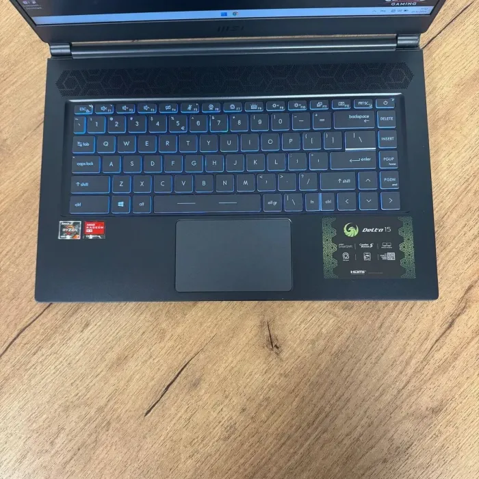Ігровий ноутбук Б-клас MSI Delta 15 A5EFK / 15.6" (1920x1080) IPS / AMD Ryzen 7 5800H (8 (16) ядер по 3.2 - 4.4 GHz) / 16 GB DDR4 / 1000 GB SSD / AMD Radeon RX 6700M, 10 GB GDDR6, 160-bit / WebCam б/в - зображення 7