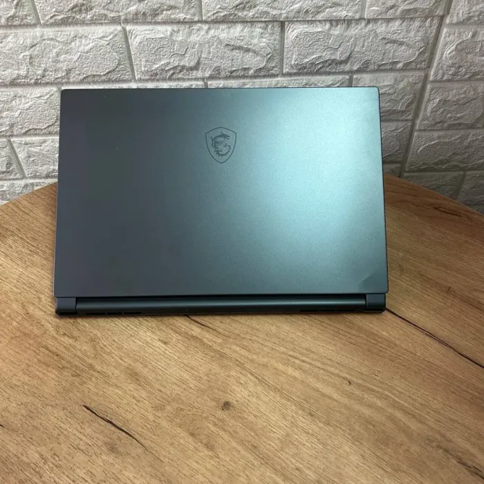 Ігровий ноутбук MSI Stealth 15M A11UEKV / 15.6" (1920x1080) IPS / Intel Core i7-11375H (4 (8) ядра по 3.0 - 5.0 GHz) / 16 GB DDR4 / 512 GB SSD / nVidia GeForce RTX 3060, 6 GB GDDR6, 192-bit / WebCam б/в - зображення 3