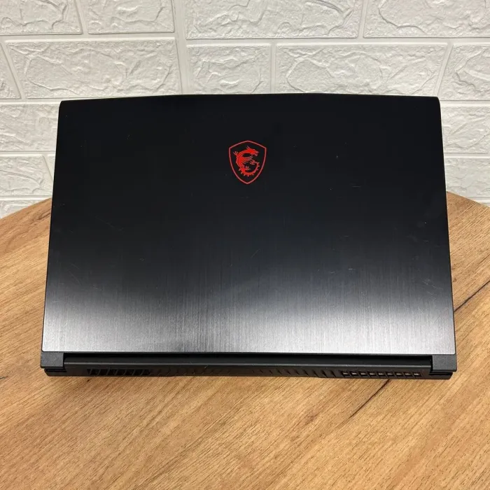 Ігровий ноутбук Б-клас MSI GF65 Thin 10SDR / 15.6" (1920x1080) IPS / Intel Core i7-10750H (6 (12) ядер по 2.6 - 5.0 GHz) / 16 GB DDR4 / 512 GB SSD / nVidia GeForce GTX 1660 Ti, 6 GB GDDR6, 192-bit / WebCam б/в - зображення 3