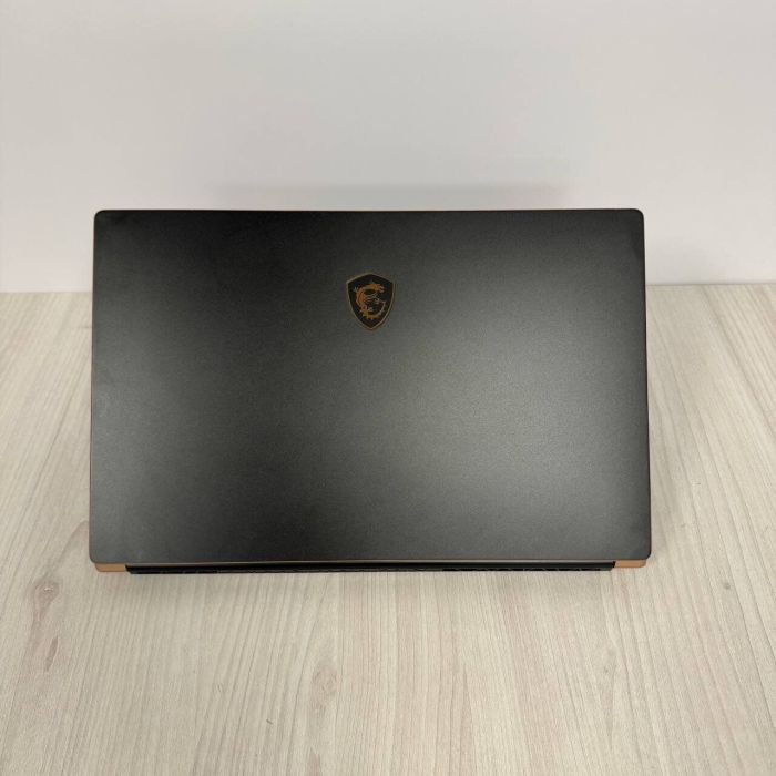 Ігровий ноутбук Б-клас MSI GS75 Stealth 10SE / 17.3" (1920x1080) IPS / Intel Core i7-10875H (8 (16) ядер по 2.3 - 5.1 GHz) / 16 GB DDR4 / 512 GB SSD NVMe / nVidia GeForce RTX 2060, 6 GB GDDR6, 192-bit / WebCam б/в - зображення 3