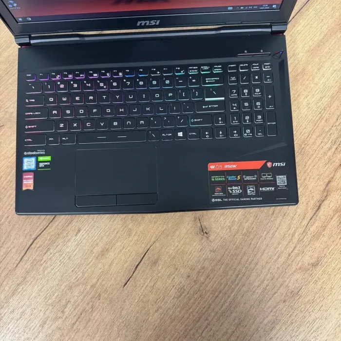 Ігровий ноутбук Б-клас MSI GL63 9SDK / 15.6" (1920x1080) IPS / Intel Core i7-9750H (6 (12) ядер по 2.6 - 4.5 GHz) / 16 GB DDR4 / 512 GB SSD / nVidia GeForce GTX 1660 Ti, 6 GB GDDR6, 192-bit / WebCam б/в - зображення 7