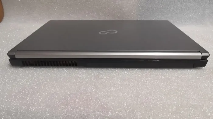 Мобільна робоча станція Fujitsu Celsius H760 / 15.6" (1920x1080) IPS / Intel Core i7-6820HQ (4 (8) ядра по 2.7 - 3.6 GHz) / 16 GB DDR4 / 256 GB SSD / nVidia Quadro M2000M, 4 GB GDDR5, 128-bit / WebCam / DVD-ROM / Windows 10 Pro б/в - зображення 8