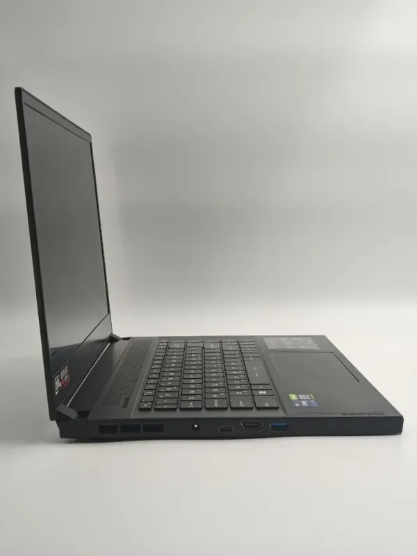 Ігровий ноутбук Б-класу MSI GS66 Stealth 11UH / 15,6" (1920x1080) IPS / Intel Core i9-11900H (8 (16) ядер по 2,1 - 4,9 ГГц) / 32 ГБ DDR4 / 256 ГБ SSD+256 ГБ SSD / nVidia GeForce RTX 3080, 16 ГБ GDDR6, 256-біт / WebCam б/в - зображення 5