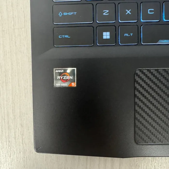 Ігровий ноутбук Б-класу MSI Bravo 15 C7VE / 15,6" (1920x1080) IPS / AMD Ryzen 5 7535HS (6 (12) ядер по 3,3 - 4,55 ГГц) / 16 ГБ DDR5 / 512 ГБ SSD / nVidia GeForce RTX 4050, 6 ГБ GDDR6, 96-біт / WebCam б/в - изображение 6