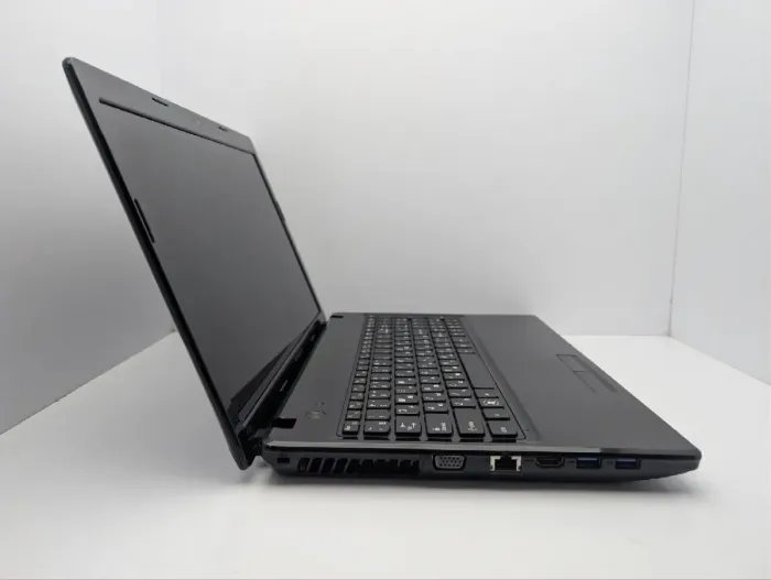 Ноутбук Lenovo IdeaPad G585 / 15.6" (1366x768) TN / AMD E1-1200 (2 ядра по 1.4 GHz) / 6 GB DDR3 / 500 GB HDD / AMD Radeon HD 7310 Graphics / WebCam / DVD-ROM б/в - зображення 4
