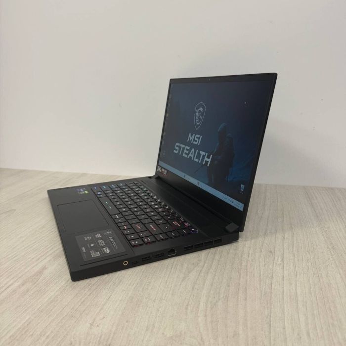 Ігровий ноутбук MSI GS66 Stealth 11UH / 15.6" (1920x1080) IPS / Intel Core i9-11900H (8 (16) ядер по 2,5 - 4,9 ГГц) / 16 ГБ DDR4 / 512 ГБ SSD / nVidia GeForce RTX 3080, 16 ГБ GDDR6, 256-біт / WebCam б/в - изображение 5