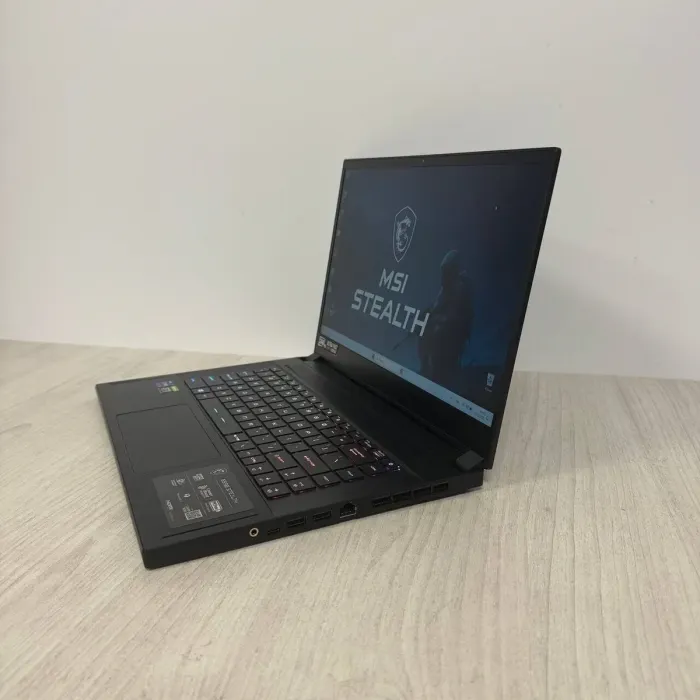Ігровий ноутбук MSI GS66 Stealth 11UH / 15.6" (1920x1080) IPS / Intel Core i9-11900H (8 (16) ядер по 2,5 - 4,9 ГГц) / 16 ГБ DDR4 / 512 ГБ SSD / nVidia GeForce RTX 3080, 16 ГБ GDDR6, 256-біт / WebCam б/в - изображение 5