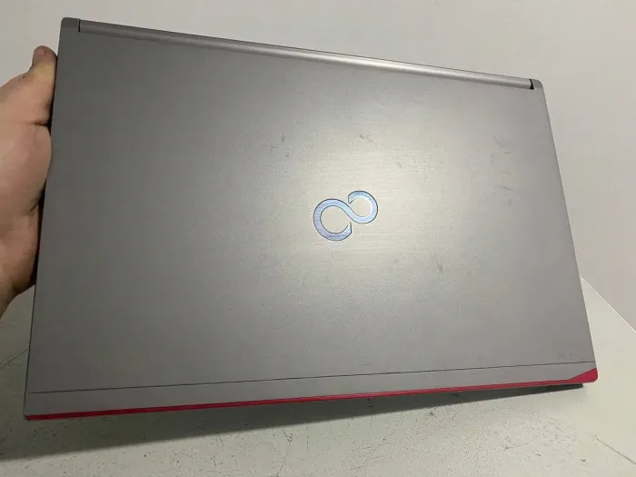 Ноутбук Б-клас Fujitsu LifeBook E754 / 15.6" (1920x1080) IPS / Intel Core i5-4200M (2 (4) ядра по 2.5 - 3.1 GHz) / 8 GB DDR3 / 128 GB SSD / Intel HD Graphics 4600 / WebCam / DVD-ROM / VGA б/в - зображення 5