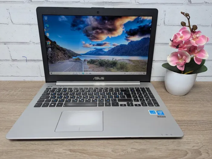 Ноутбук Б-клас Asus R553L / 15.6" (1366x768) TN / Intel Core i3-4030U (2 (4) ядра по 1.9 GHz) / 8 GB DDR3 / 128 GB SSD / Intel HD Graphics 4400 / WebCam / DVD-ROM б/в - зображення 3