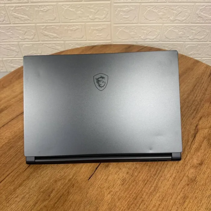 Ігровий ноутбук Б-клас MSI Stealth 15M A11UEKV / 15.6" (1920x1080) IPS / Intel Core i7-11375H (4 (8) ядра по 3.0 - 5.0 GHz) / 16 GB DDR4 / 512 GB SSD NVMe / nVidia GeForce RTX 3060, 6 GB GDDR6, 192-bit / WebCam б/в - зображення 3