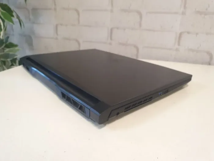 Ігровий ноутбук MSI Katana GF66 11UE-1006NEU / 15.6" (1920x1080) IPS / Intel Core i5-11400H (6 (12) ядер по 2.2 - 4.5 GHz) / 16 GB DDR4 / 512 GB SSD / nVidia GeForce RTX 3060, 6 GB GDDR6, 192-bit / WebCam б/в - зображення 7