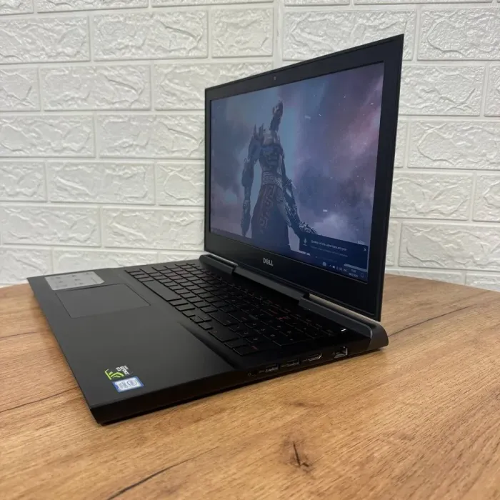 Ігровий ноутбук Б-клас Dell Inspiron 15 Gaming 7567 / 15.6" (1920x1080) TN / Intel Core i7-7700HQ (4 (8) ядра по 2.8 - 3.8 GHz) / 16 GB DDR4 / 120 GB SSD + 1000 GB HDD / nVidia GeForce GTX 1050 Ti, 4 GB GDDR5, 128-bit / WebCam б/в - зображення 5